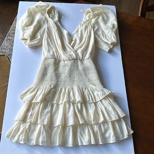 Cream colored V neck Vestique dress